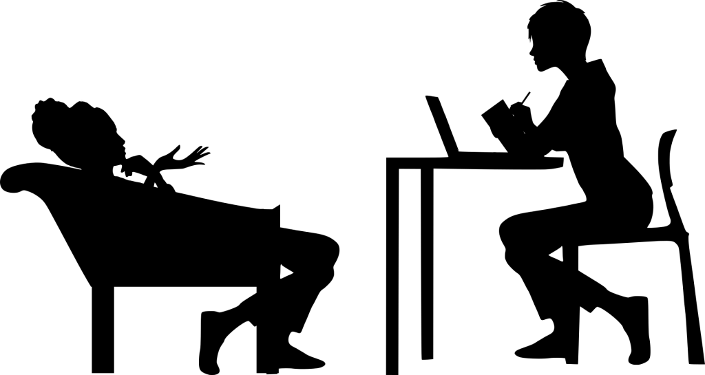 A silhouette depicting a patient and therapist conversing.