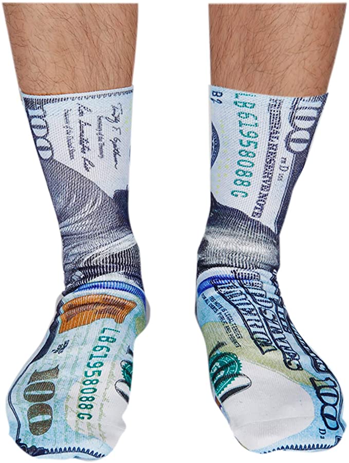 A pair of socks with the U.S. $100 bill printed on them.